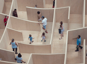 People searching through a maze